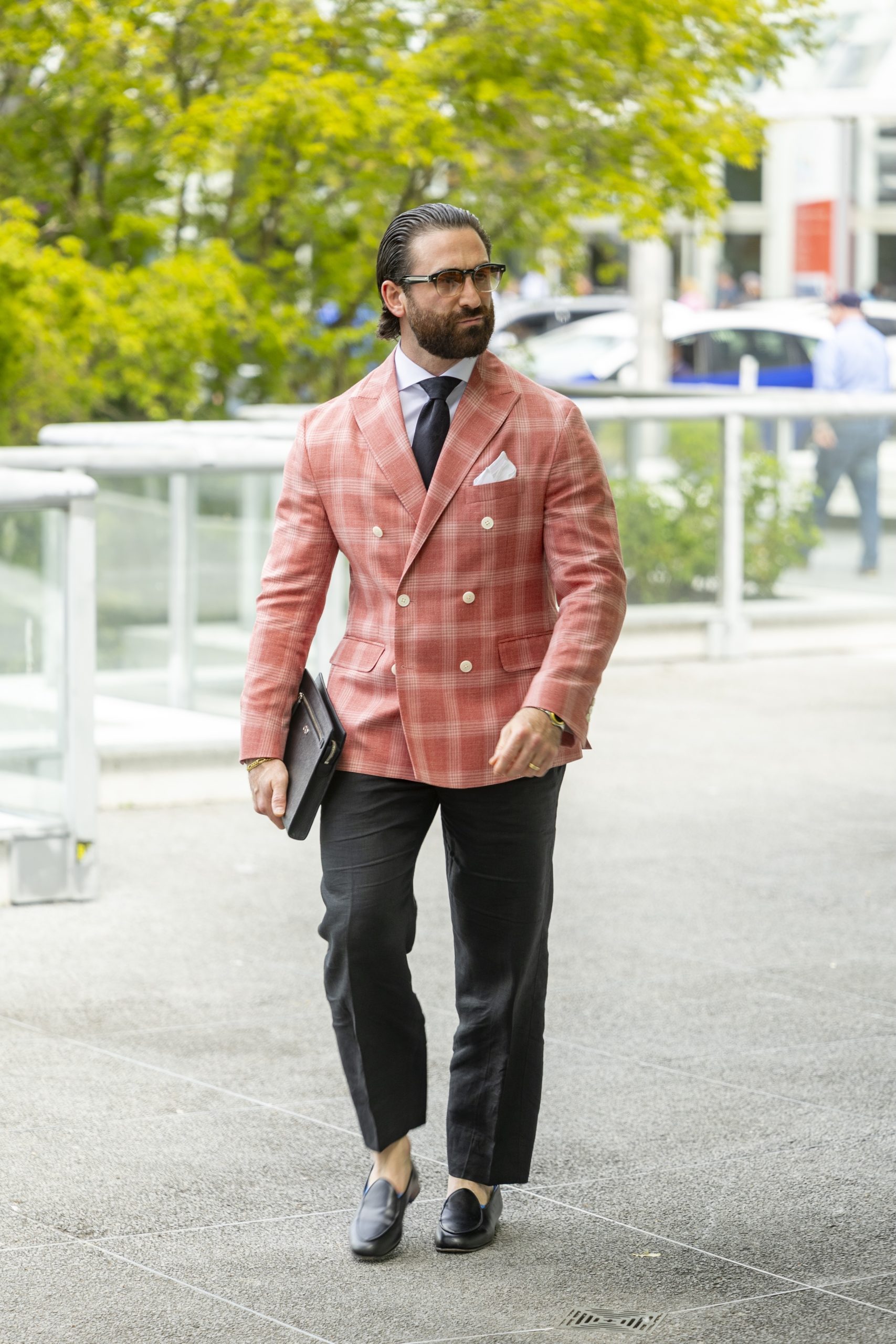 Jacket on an athletic build showing clean drape in a Vancouver fitting room.